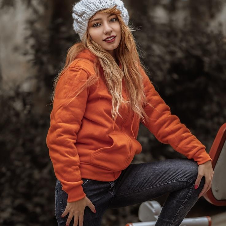 Kaveri Mehta, Lead Design Curator at AncientCanvasArt, reviewing corporate floral arrangements